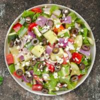 Greek Salad · Tomatoes, cucumber, onion, and olives tossed with your choice of dressing.