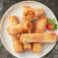 Spring Roll · (4 pieces) Seasonal vegetables wrapped in rice wrapper and fried until golden crisp.