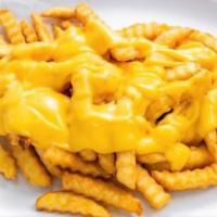 Cheese Fries · Melted cheddar cheese over our delicious fries.