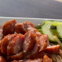 Isan Thai Sausage · Three Traditional & Slightly Sour Thai Sausages. Made with fresh Thai herbs. Served with Fre...