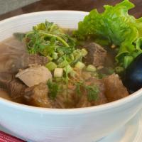 Beef Noodle Soup · Spicy. Beef, Stewed with Beef tendon beef meatball in a meat broth. Rice noodles, bean sprou...