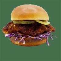 Nashville Hot Chicken · Crispy Chicken drenched in Nashville Hot Sauce, Red Cabbage, Coleslaw Dressing, Pickles