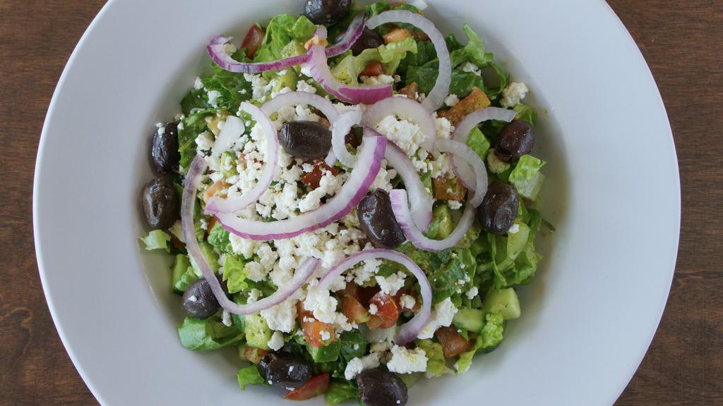 Greek Salad · Fresh romaine lettuce, cucumbers, tomatoes, red onion, feta cheese, Kalamata olives, and house made dressing. Add grilled chicken for an additional charge.