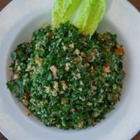 Tabbouleh · Chopped parsley, mint, tomato, cracked wheat, tossed with lemon juice and olive oil. Add gri...