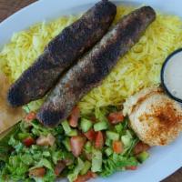 Kafta Kabob · Served with rice, salad and Hummus