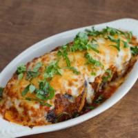 Eggplants Parmesan Plate · Breaded eggplant baked with marinara sauce and a blend of parmesan / mozzarella cheese.