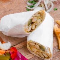 Chicken Shawarma Wrap · Thin slices of marinated chicken with garlic sauce, and pickles.
