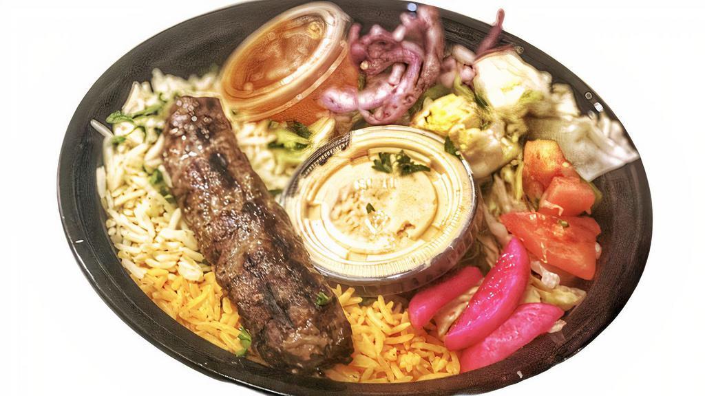 Kefta Kabab Bowl · A special of ground beef & Lamb, parsley, onions and spices grilled on a skewer. (1 skewer) served with rice, salad, hummus and pita bread.
