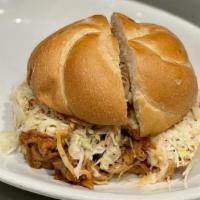 Smokin’ Willy Pulled Pork · Pork BBQ smoked on premises, with our homemade coleslaw.  A guaranteed treat for all BBQ lov...