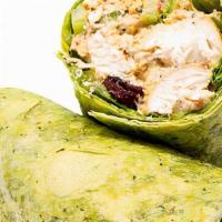Crispy Chicken Wrap W/Fries · Crispy all white meat tenders stuffed in a warm spinach Tortilla with cheese, sauce and topp...