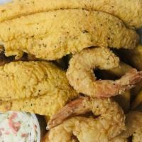 Fish & Shrimp Combo Platter · Fried Catfish or Whiting, Jumbo Shrimp, Cajun Fries, Hush Puppies and Coleslaw.