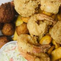 Jumbo Fried Shrimp Combo · Fresh Jumbo Shrimp, lightly dusted, flash-fried and served with Cajun Fries, Hush Puppies an...