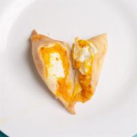 Samosa Desire (Mango & Cream Cheese) Box · 4 Sweet Samosas with Mango & Cream Cheese.