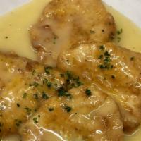 Pollo Francese · Chicken scaloppine dipped in egg batter, pan-fried and finished in a white wine lemon sauce.
