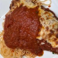 Veal Parmigiana · Oven baked, breaded and fried veal cutlet with our homemade marinara sauce and mozzarella ch...
