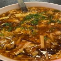 Large Hot & Sour Soup · Tofu, black mushroom, bamboo strips, egg, white pepper, vinegar.