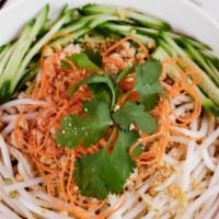 Dan Dan Noodles · Ground chicken, sweet and sour sauce, bean sprouts, cucumber, chopped peanuts, carrot.