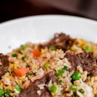 Beef Fried Rice · Beef, green peas, green onion, carrot, egg.