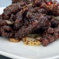 Black Pepper Beef · Tender beef, onion, spicy chili pepper, black pepper sauce.