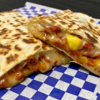 Gringas · Cheese, pastor meat, grilled pineapple on two flour tortillas with a side of seasoned fries.