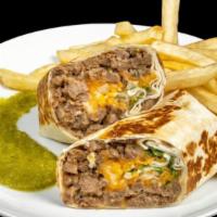 Unico'S Burrito · Refried beans, beef, cheese, cilantro, diced onions, and our signature salsa verde in a larg...
