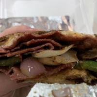 #14. Yenta'S Over Stuffed Pastrami · Pastrami, Russian dressing or mustard with provolone cheese, peppers and onions.