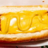 Coney Island Chili Dog · Topped with mustard, chili, and cheese.