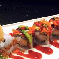 Dancing Dragon Roll · Spicy tuna and mango inside with spicy shrimp on the top with spicy sauce.