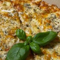 White Pizza (12 Inches) · Our fresh dough, sprinkled with garlic and oregano, topped with mozzarella, provolone and ch...