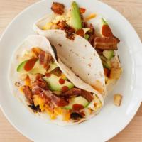 Dylan'S Bad Bougie Breakfast Tacos · 2 flour tortillas fitted with scrambled eggs, diced breakfast potatoes, Monterey Jack cheese...