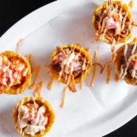 Tostone Cups · Five stuffed, mini tostone cups. Two pernil, one beef, one chicken and one shrimp, topped wi...
