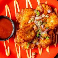 Queso Frito · Six fried cheese sticks with guava Sriracha sauce.