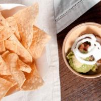 Ranch Dip · Queso with beef, guacamole and sour cream. Served with chips.