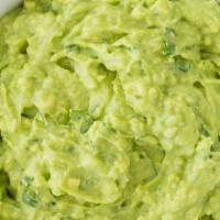 Guacamole · Warmed house made chips with fresh made guacamole.