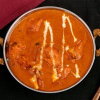 Chicken Tikka Masala · Tender pieces of boneless chicken breast marinated with yogurt and tandoori spice blend cook...