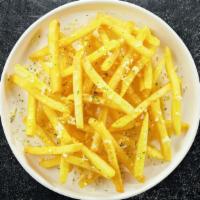 Cheesy Truffle Fries · Idaho potato fries cooked until golden brown and garnished with salt, truffle oil, and parme...