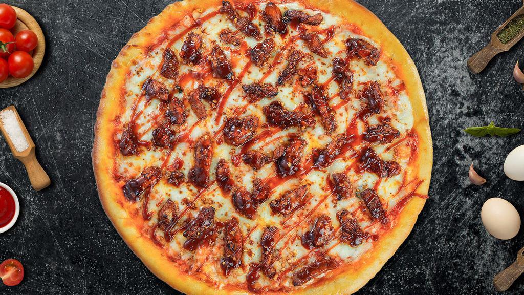 Cue The Chicken Bbq Pizza · Barbecue sauce, juicy chicken, mozzarella, marinara, chopped garlic, fresh basil, and extra virgin olive oil baked on a hand-tossed dough.