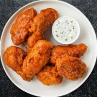 Habanero Heat Wings · Fresh chicken wings breaded, fried until golden brown, and tossed in habanero sauce. Served ...