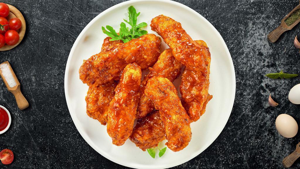 Bbq Boi Boneless Wings · Fresh boneless chicken wings breaded, fried until golden brown, and tossed in barbecue sauce. Served with a side of ranch or bleu cheese.