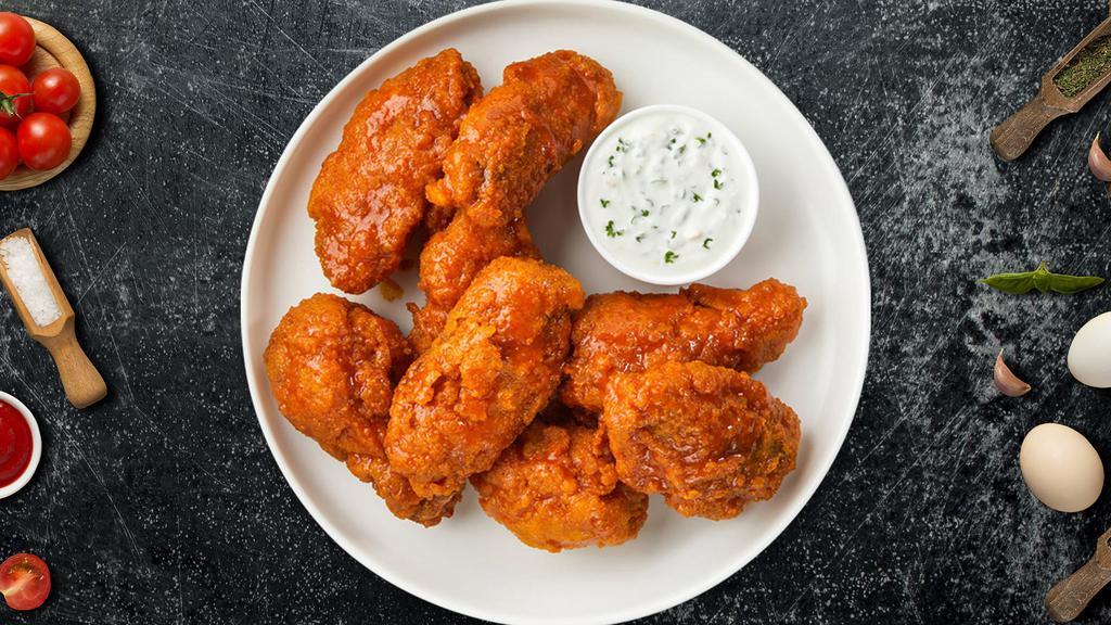 Habanero Heat Boneless Wings · Fresh boneless chicken wings breaded, fried until golden brown, and tossed in habanero sauce. Served with a side of ranch or bleu cheese.