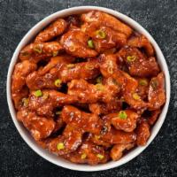 Spiced Bite Boneless Wings · Fresh boneless chicken wings breaded, fried until golden brown, and tossed in spicy sauce. S...