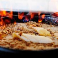 Banana Foster · Just ripe bananas, sautéed with butter, brown sugar and caramelized. Flambeed with brandy an...