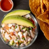 Ceviche With Chips · 16 oz shrimp ceviche with chips and Valentina sauce.