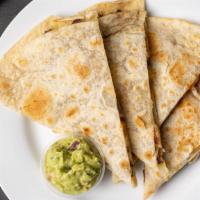 Large Surf & Turf Quesadilla · Flour Tortilla Only
Served with side of pico de gallo and guacamole