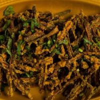 Kurkuri Bhindi · Crispy fried okra with chaat masala and a sprinkle of cilantro