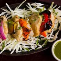 Jashan Soya Chop Malaiwali · Soybean chops in a creamy marinate skewered in a tandoor oven and served over seasonal veggi...