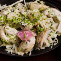 Malai Mushroom · Hand-picked mushrooms, skewered and cooked to perfection in a tandoor oven and drenched with...