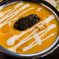 Spinach Kofta Curry · Spinach balls with gram flour in yogurt and creamy nut curry topped with milk cream
