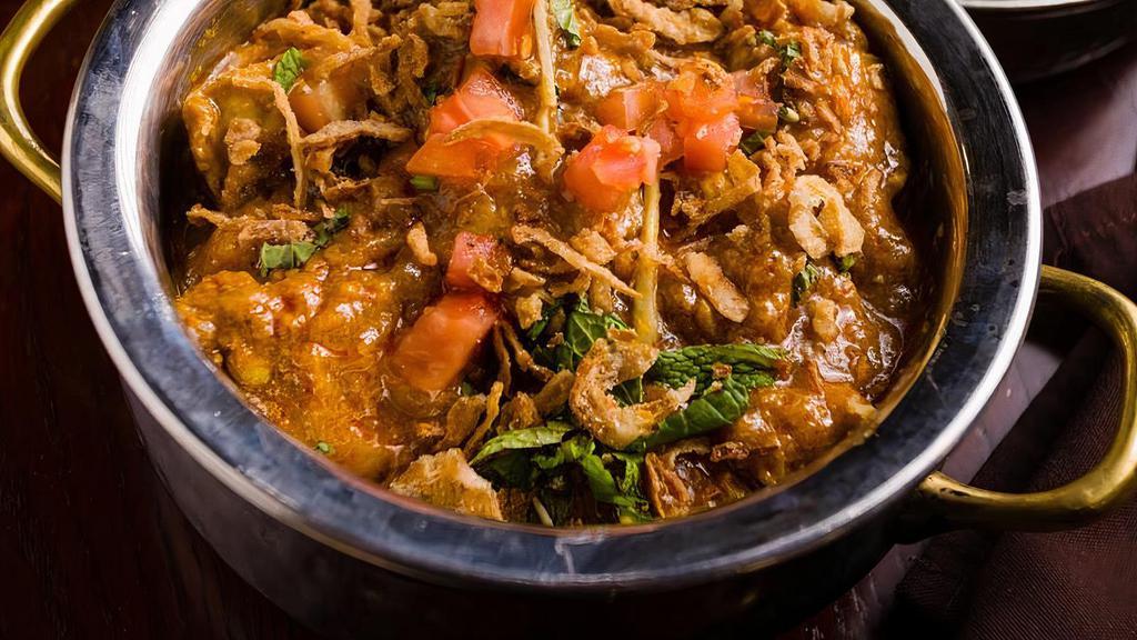 Murgh Bhuna · A well-spiced chicken curry with a thick sauce.
