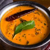 Malabar Murgh Curry · Chicken with curry leaves, red chili, mustard seed in creamy white sauce.